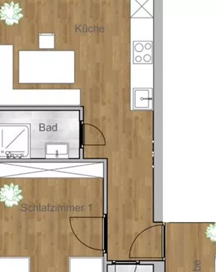 A floor plan of an apartment with two bedrooms, a kitchen, and a bathroom. The plan also shows an outdoor dining area.